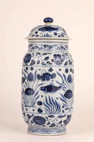 A BLUE AND WHITE 'FISH AND WATER PLANT' JAR