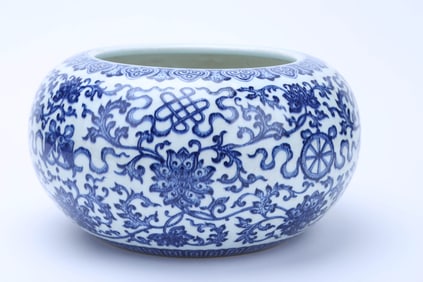 A BLUE AND WHITE 'SCROLLING LOTUS AND RUYI' JAR
