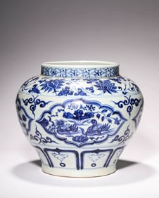 A BLUE AND WHITE 'FLOWER AND BIRD' JAR WITH PANELS