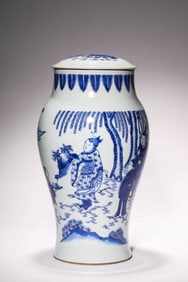 A BLUE AND WHITE 'LANDSCAPE AND FIGURES' LIDDED JAR