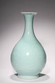 A CELADON-GLAZED 'INCISED DRAGON AND CLOUD' YUHUCHUN VASE