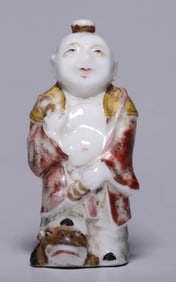 A FAMILLE ROSE 'LIU HAI AND GOLDEN TOAD' SNUFF BOTTLE