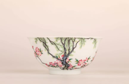 A FAMILLE ROSE 'APRICOT GROVE AND SPRING SWALLOW' BOWL
