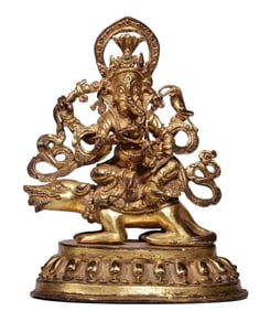 A GILT-BRONZE FIGURE OF GANAPATI WITH ELEPHANT NOSE