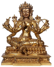 A GILT-BRONZE 'WISH-FULFILLING TARA' INLAID WITH GEMSTONES