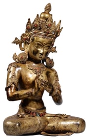 A GILT-BRONZE AND GEM-INLAID SEATED GUANYIN