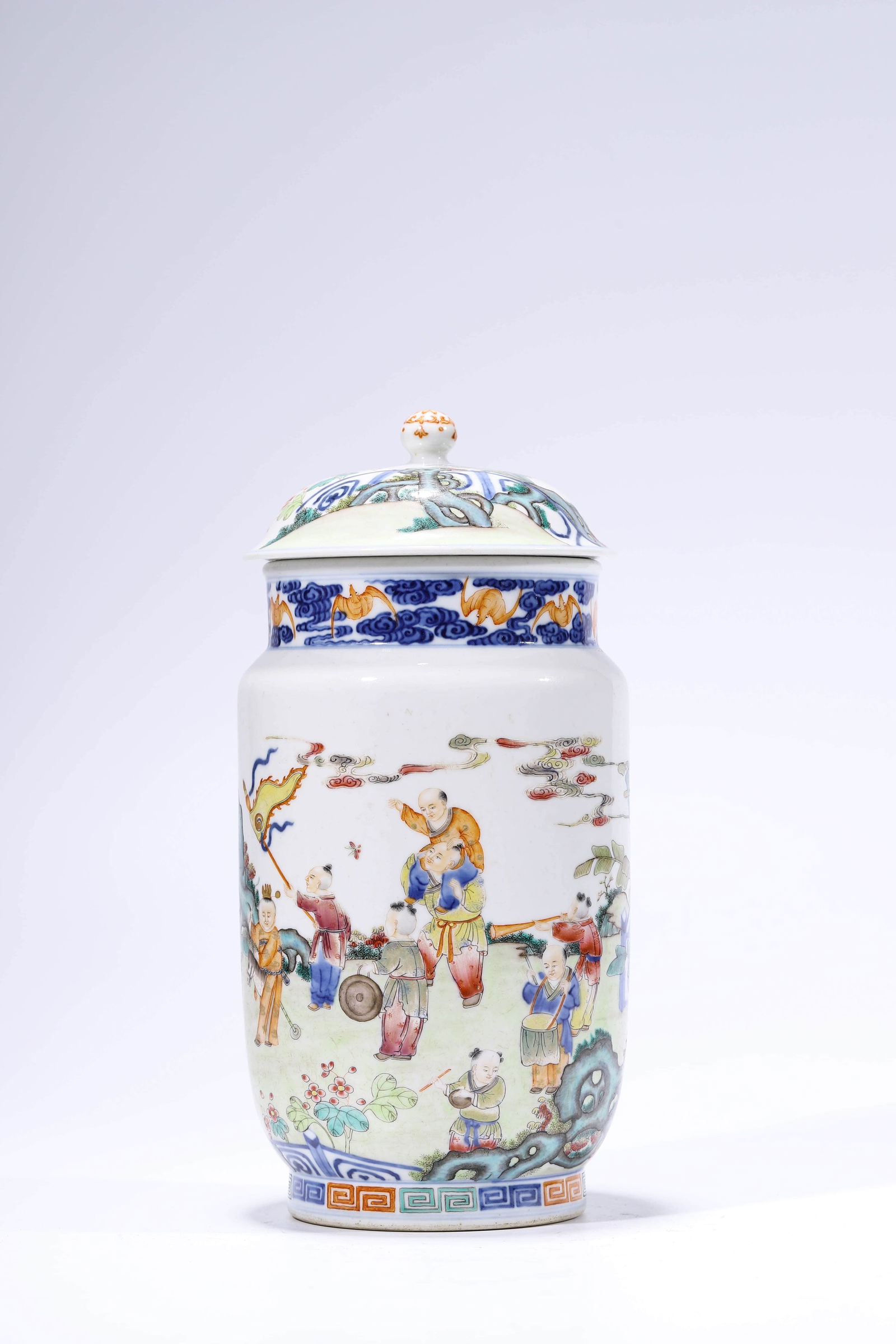 A FAMILLE-ROSE COVERED JAR WITH BOYS AT PLAY: Dimensions: 13.7 cm (5.4 in.) wide x 29.2 cm (11.5 in.) high. All measurements are approximate.