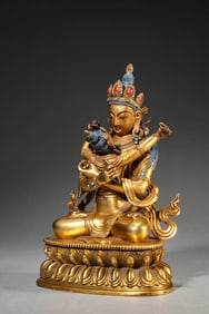 A GILT-BRONZE BUDDHA