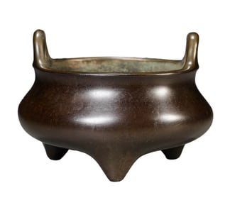A BRONZE BRIDGE-HANDLE CENSER