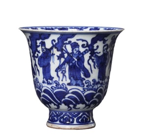 A BLUE AND WHITE 'FIGURES' CUP