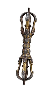 A TIBETAN IRON AND GILT VAJRA