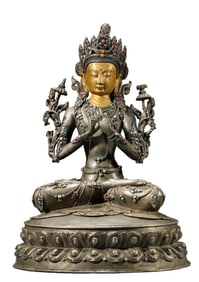 A TIBETAN SILVER MANJUSHRI