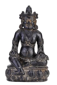 A TIBETAN BLACK SACRED STONE YELLOW JAMBHALA