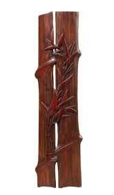 A BAMBOO CARVED BAMBOO WRIST REST