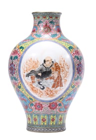 A YELLOW-GROUND FAMILLE ROSE MEDALLION 'ARHATS' VASE