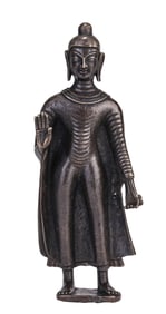 A TIBETAN GUGE-STYLE ALLOY COPPER SILVER-INLAID SHAKYAMUNI