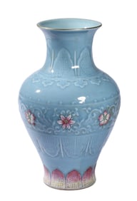 A BLUE-GLAZED CARVED 'FLORAL' VASE