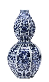 A BLUE AND WHITE 'EIGHT TREASURES AND FLOWERS' GOURD SHAPED VASE