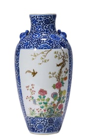 A BLUE AND WHITE WITH FAMILLE ROSE 'MAGPIES ON PLUM' VASE