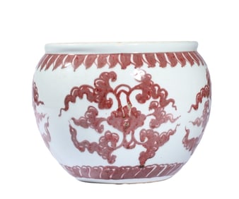 A UNDERGLAZED RED 'FLORAL' JAR
