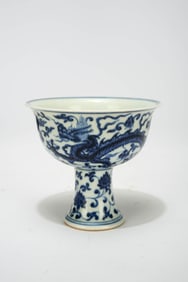 A BLUE AND WHITE 'DRAGON AND FLOWERS' STEM BOWL