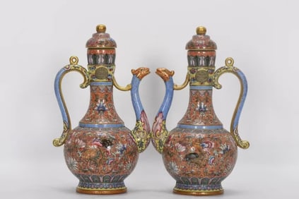 TWO ENAMEL PHOENIX-HEAD SHAPED EWERS