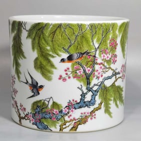 AN ENAMEL 'FLOWERS AND SWALLOWS' BRUSH HOLDER