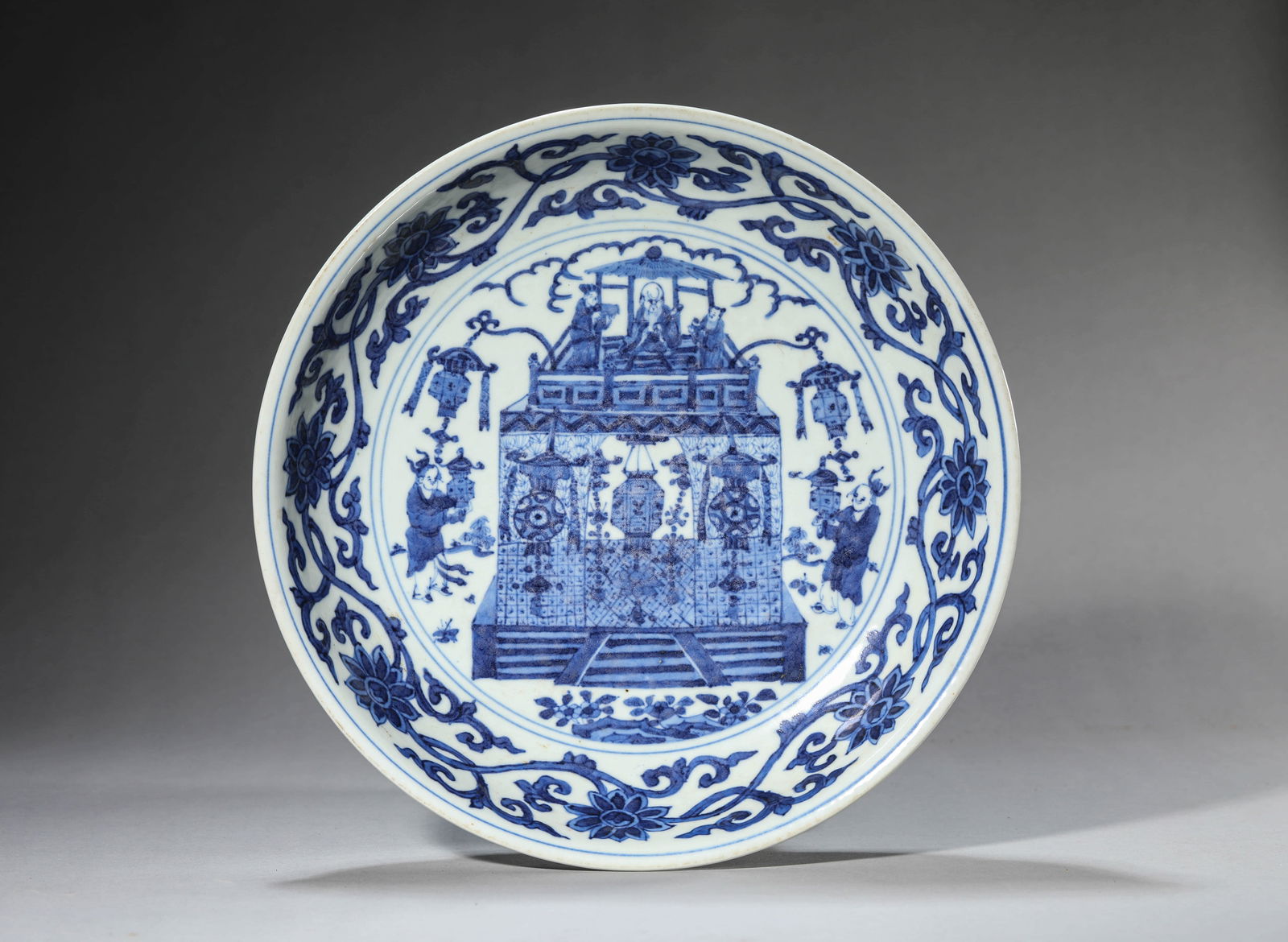 A BLUE AND WHITE 'FIGURE SCENE' DISH