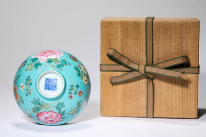 A TURQUOISE-GROUND FAMILLE ROSE 'BUTTERFLY AND FLOWER' BOWL