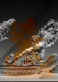 A GILT-BRONZE VAJRA HOLDER