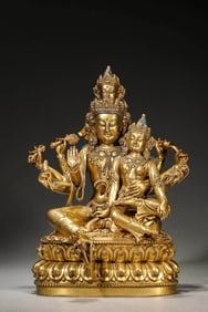 A GILT-BRONZE BUDDHIST FIGURE