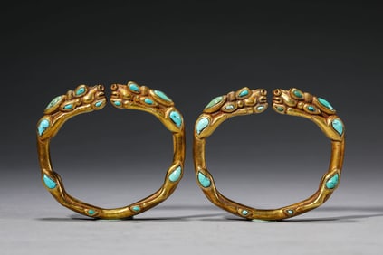 A PAIR OF GILT-SILVER GEM-SET BRACELETS