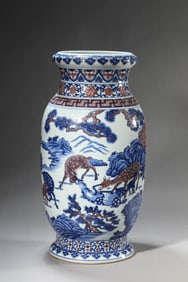 A BLUE AND WHITE WITH UNDERGLAZE-RED 'DEER AND PINE' VASE
