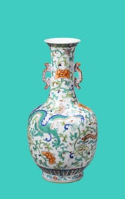 A DOUCAI 'DRAGON, PHOENIX AND FLORAL' VASE
