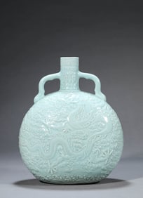 A PALE CELADON GLAZED 'CARVED DRAGON' MOONFLASK