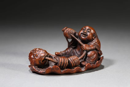 A BAMBOO 'LIU HAI AND TOAD' CARVING