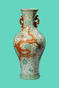 A GREEN-GROUND IRON-RED 'DRAGON AND FLORAL' VASE