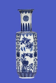 A BLUE AND WHITE 'FLOWER, BIRD AND DRAGON' VASE