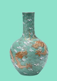 A GREEN-GROUND 'DRAGON' GLOBULAR VASE