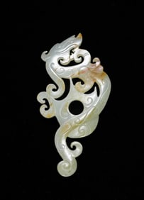 A JADE 'DRAGON' HEART-SHAPED PENDANT