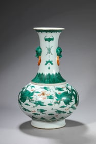 A GREEN-GLAZED 'DRAGON' VASE