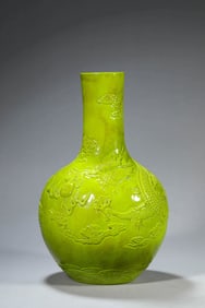 A LEMON-YELLOW GLOBULAR VASE