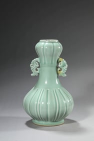 A PALE CELADON GLAZED VASE