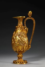 A GILT-SILVER 'EUROPEAN FIGURE' EWER