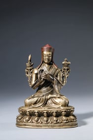A TIBET SAKYA-STYLE SILVER LAMA