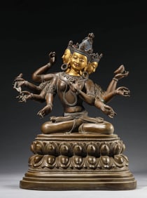 A LACQUERED-BRONZE BUDDHIST FIGURE