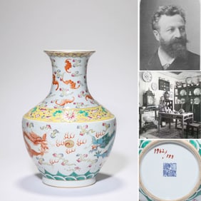 A FAMILLE-ROSE 'INTERLOCKING FLORAL AND DRAGON' VASE