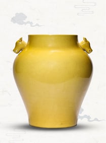 A YELLOW-GLAZED JAR