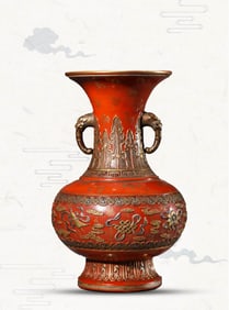 A CORAL-RED-GROUND GILT-DECORATED 'EIGHT BUDDHIST EMBLEMS' VASE