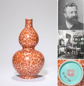 AN IRON-RED 'HUNDRED BATS' GOURD-SHAPED VASE